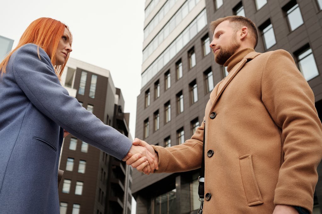 Man and Woman Shaking Hands